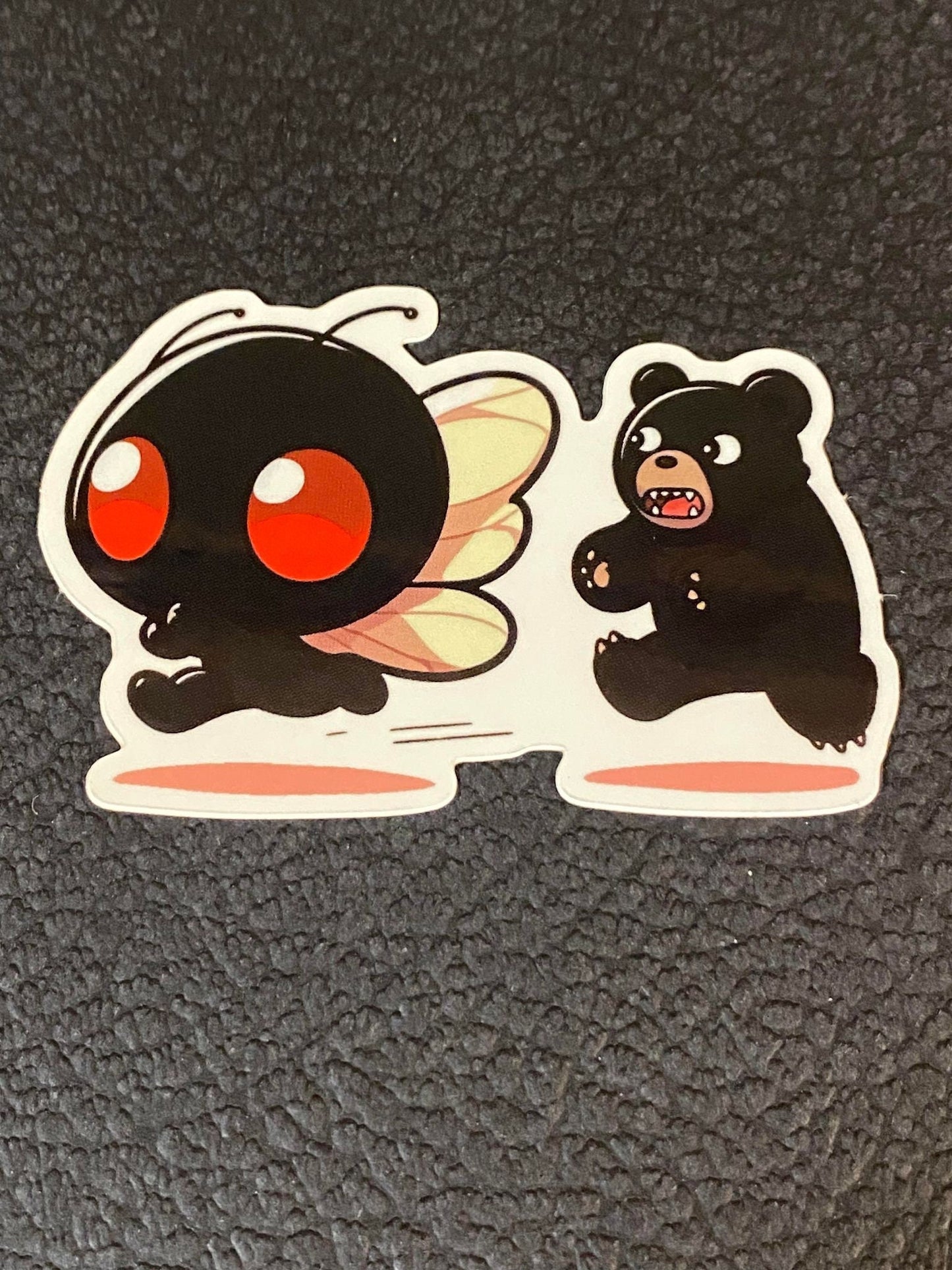 Mothman Running From Bear Sticker