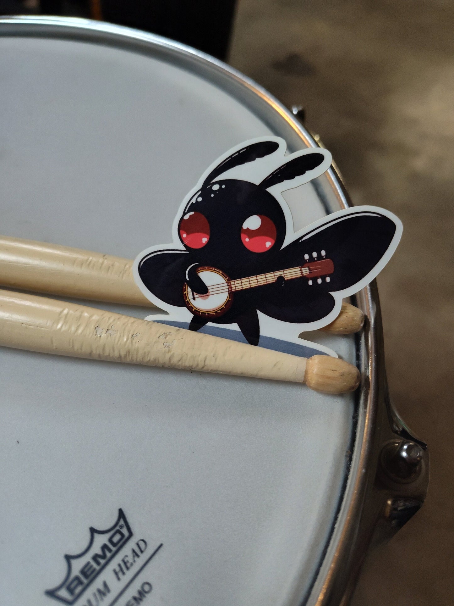 Banjo Playing Mothman Sticker