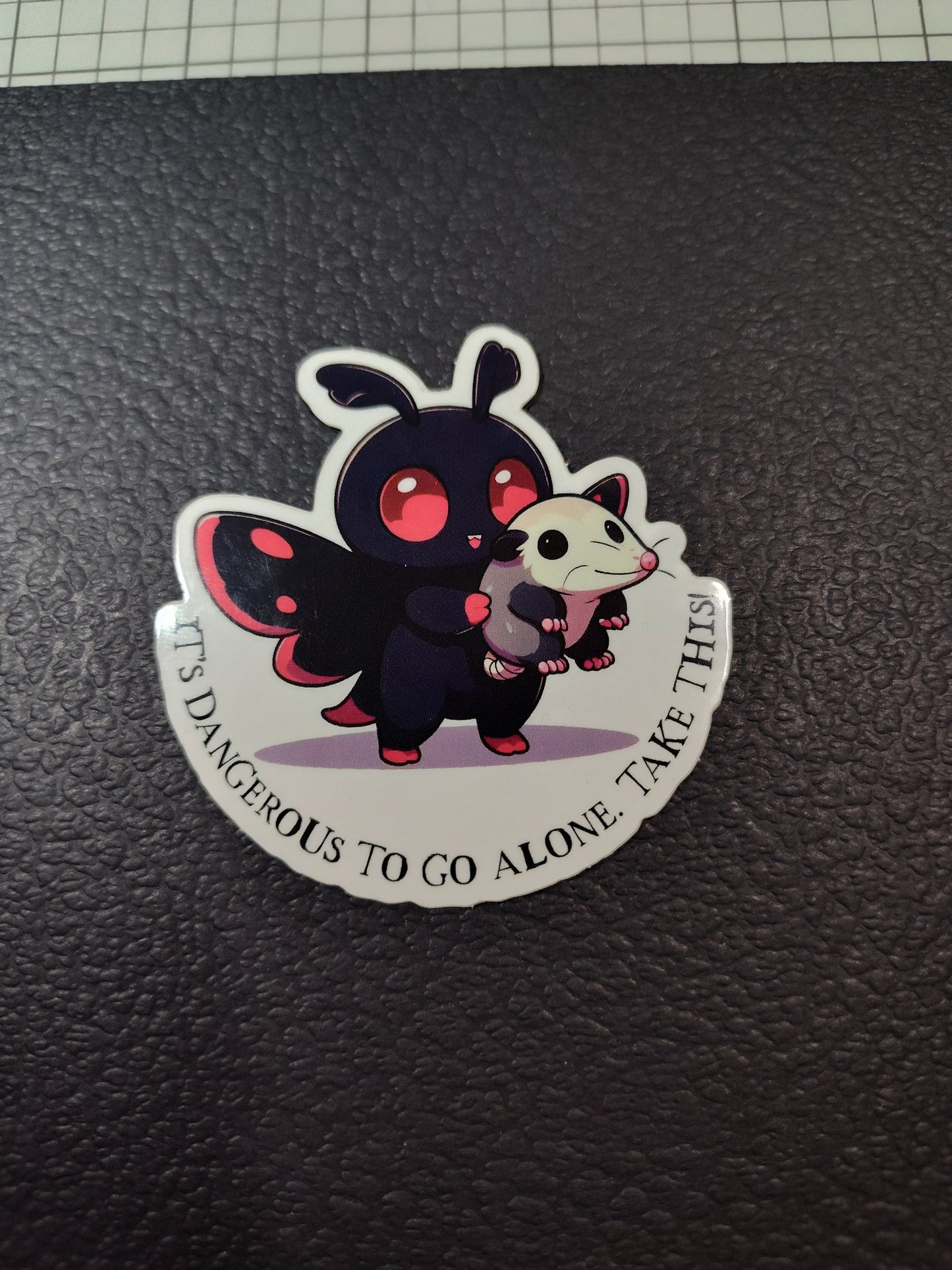 Mothman It's Dangerous to Go Alone: Mothman Opossum Sticker