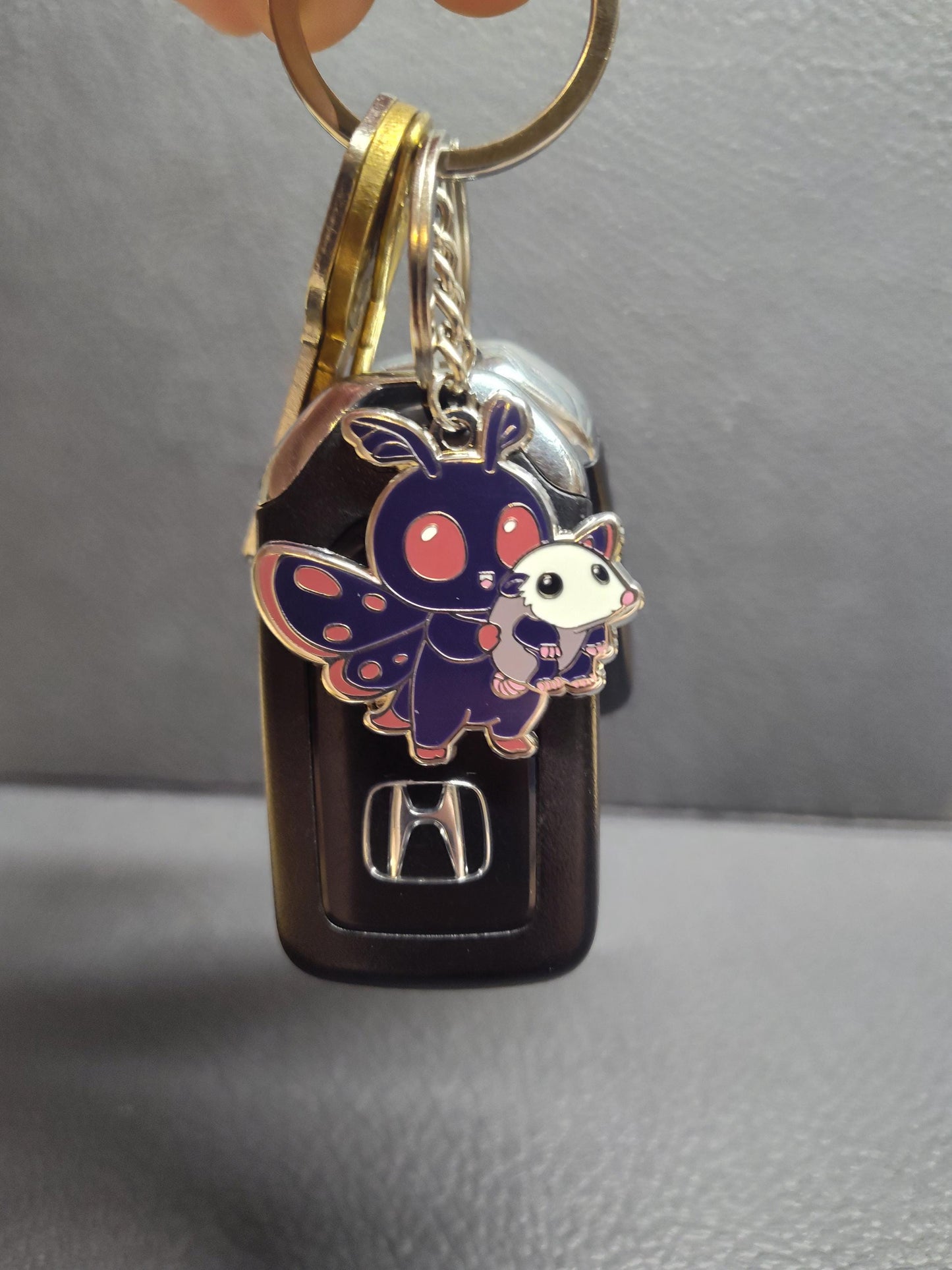 Mothman w/ Friend Enamel Keychain - Mothman and Opossum Keychain