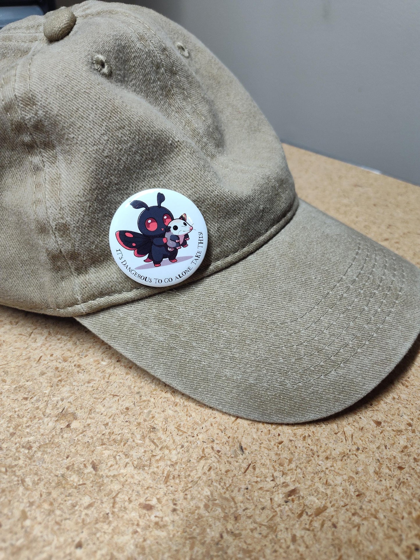 Mothman It's Dangerous Pin: Mothman Opossum Button Pin