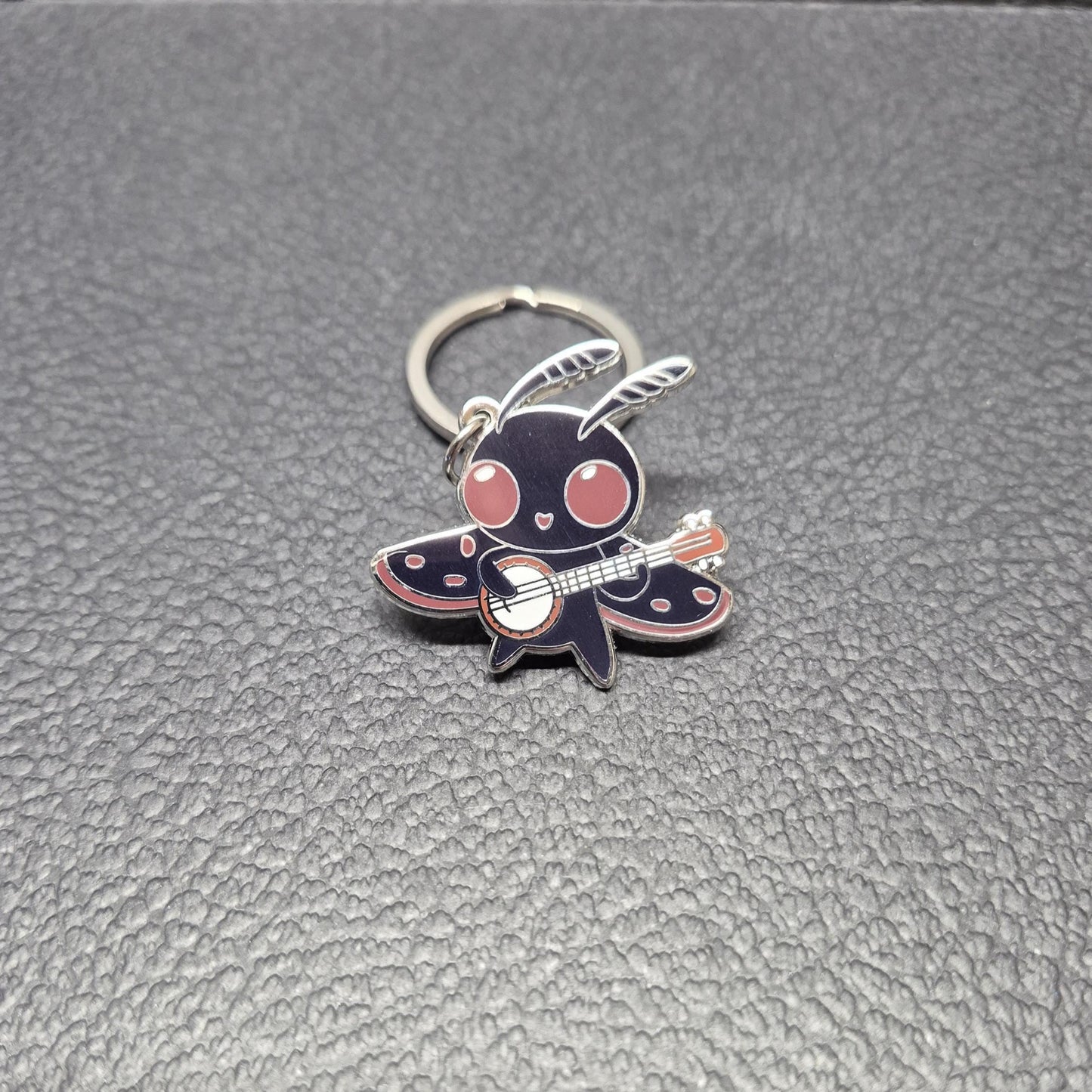 Mothman w/ Banjo Enamel Keychain - Cryptid Keychain