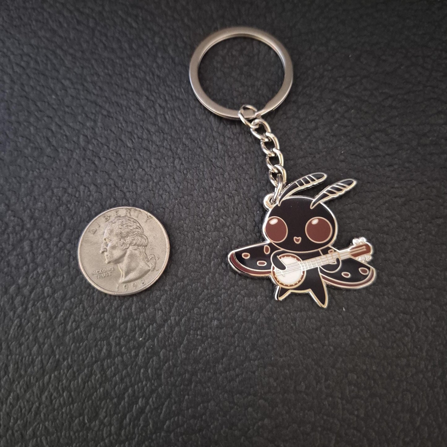Mothman w/ Banjo Enamel Keychain - Cryptid Keychain